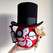 Hong Kongball with a top hat, a syringe, and a caduceus